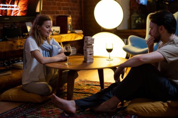 a couple sitting beside a coffee table best coffee table