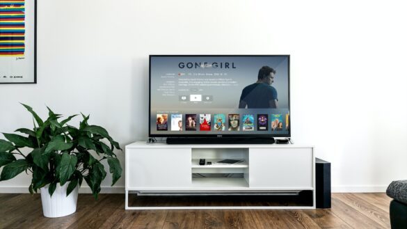 a 55-inch 4k tv placed on a table a 55-inch 4k tv placed on a table