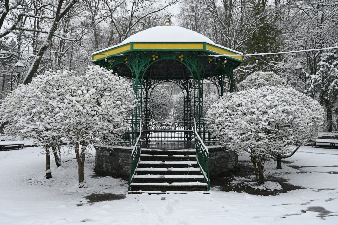 snow accumulated on a gazebo