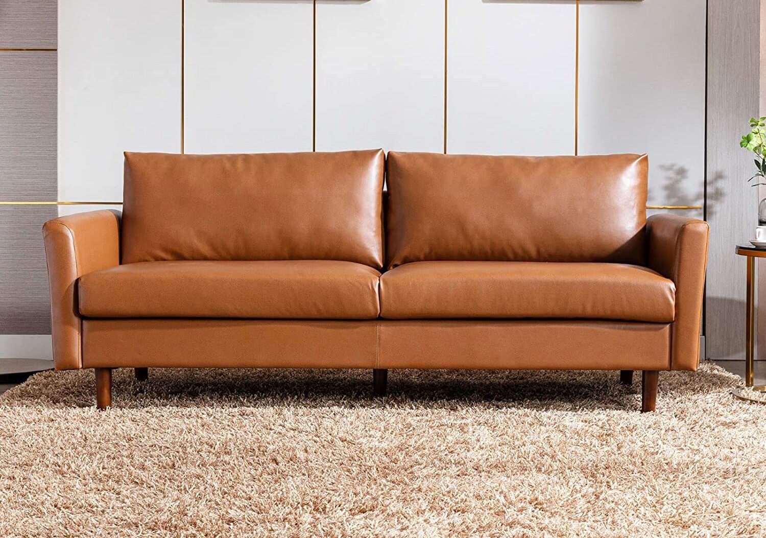faux leather couch in a farmhouse living room