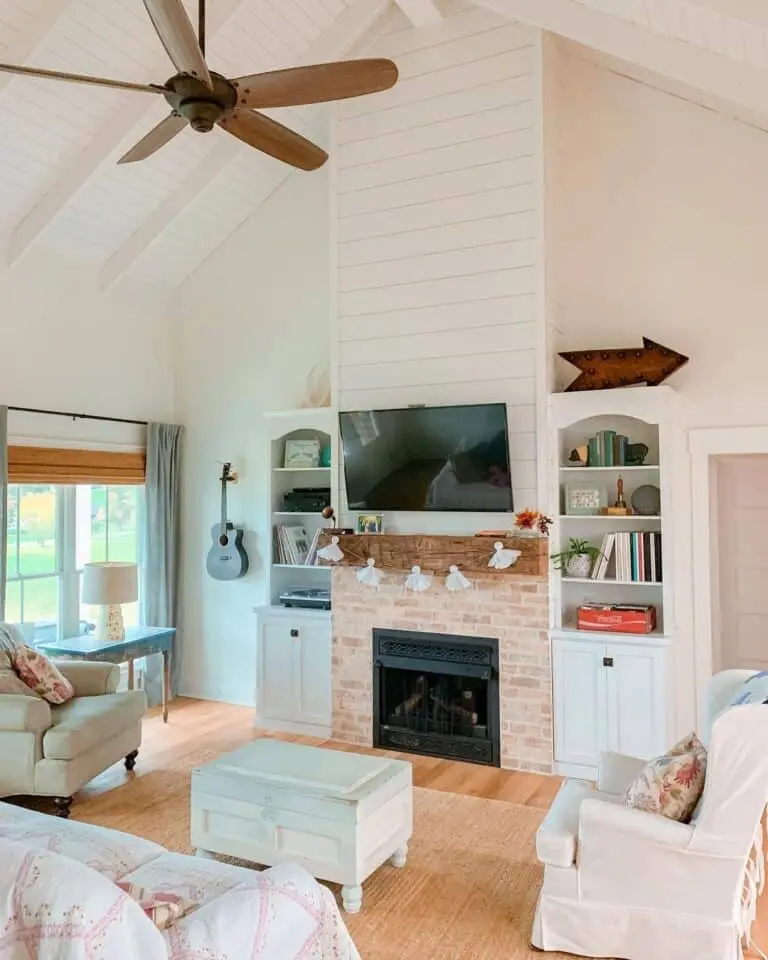 Balance and Elegance: Shiplap Living Space with Brick Fireplace