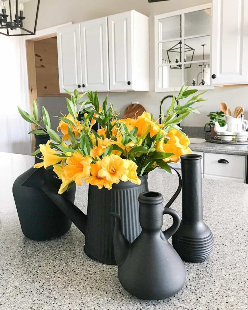 Black Vases With Yellow Floral Accents