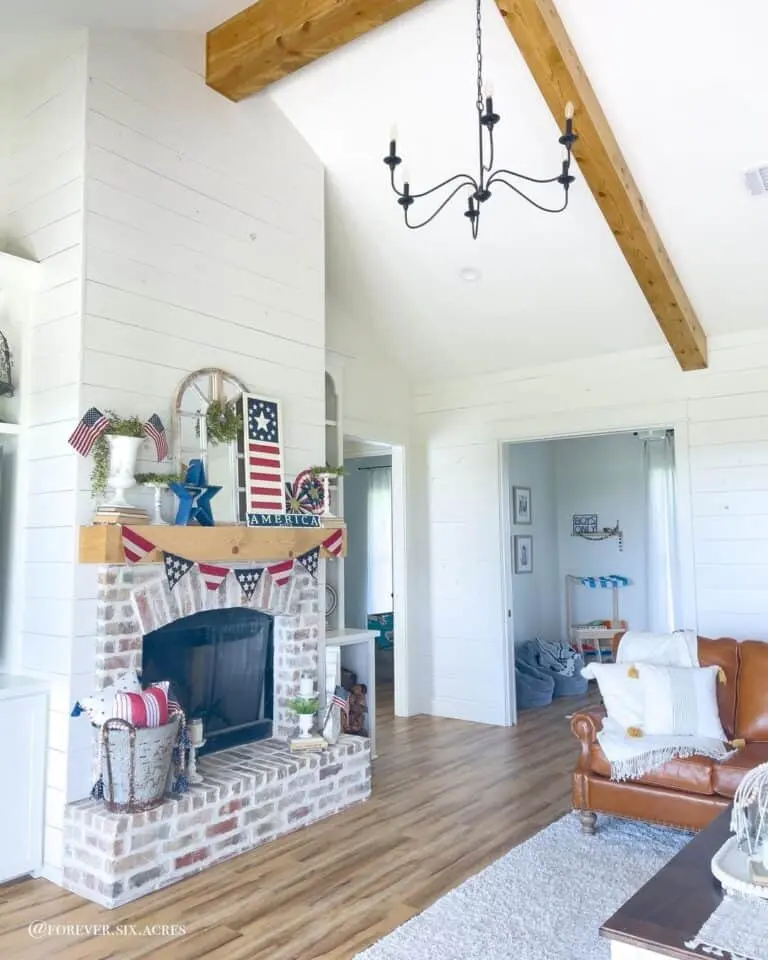 Chic Whitewashed Brick Fireplace with Light Wood Mantel