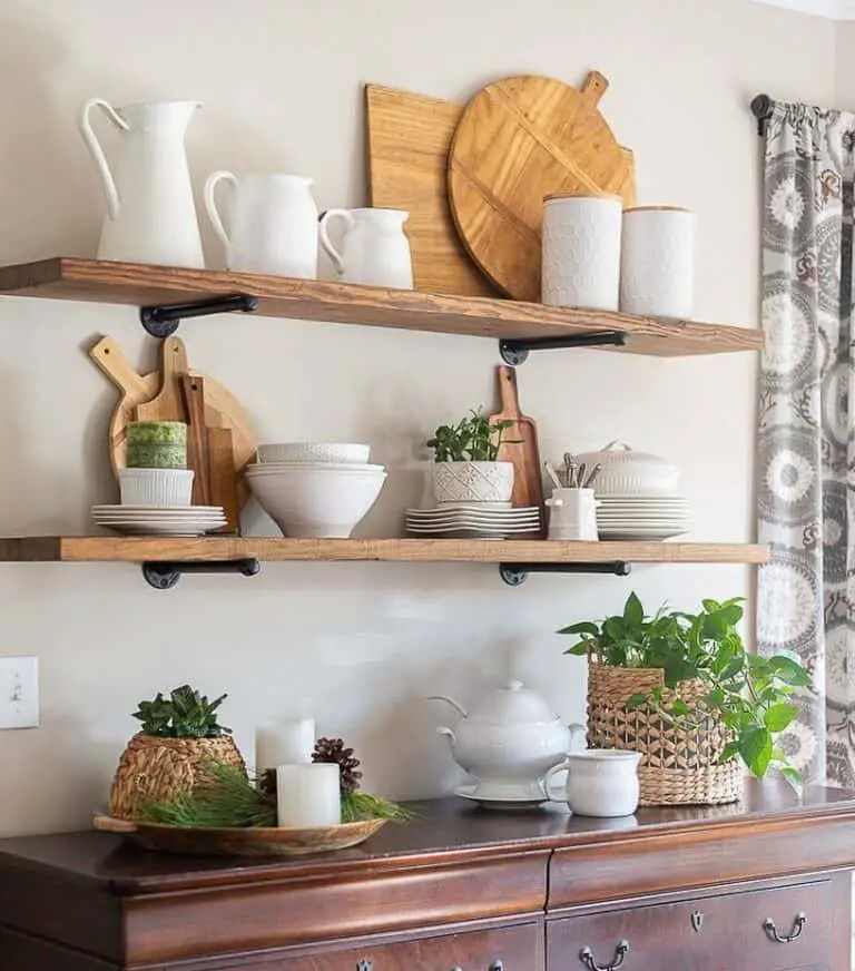 Classic Sophistication: Farmhouse Shelves Adorned with White Kitchenware