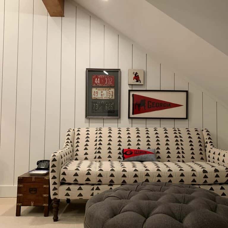 Creating Coziness: Small Seating Area With Sports Wall Décor