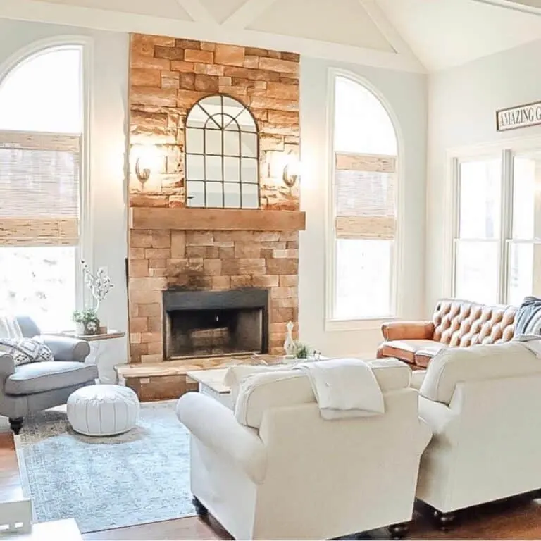 Elegance in Simplicity: Tan Dry Stacked Stone Fireplace with Wood Mantel