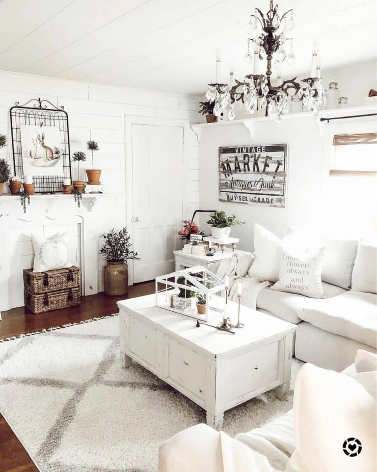 Elegance in White Living Room with Crystal Chandelier