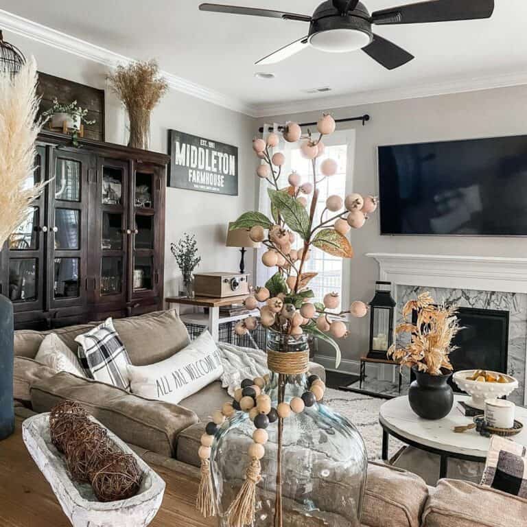 Floral Delight: Rustic Farmhouse Living Room Adorned with Blossom Accents