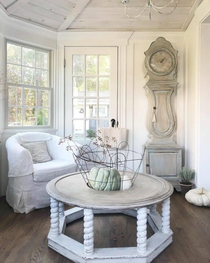 French Farmhouse Coziness: Living Room Grace with a Grandfather Clock
