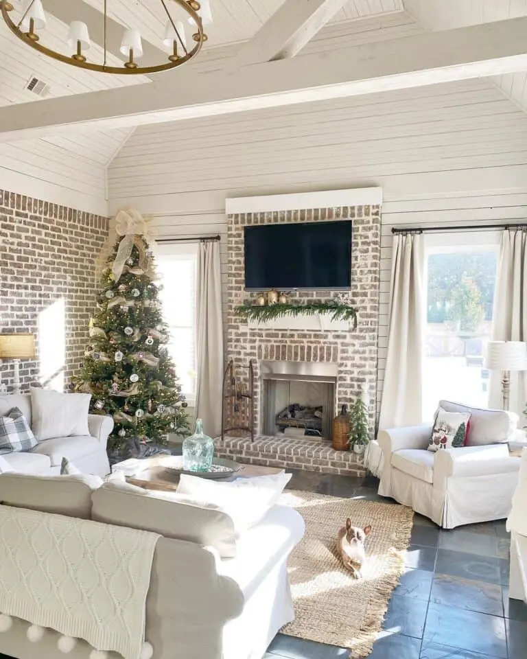 Harmonious Blend: Brick Fireplace and Shiplap Vaulted Ceiling