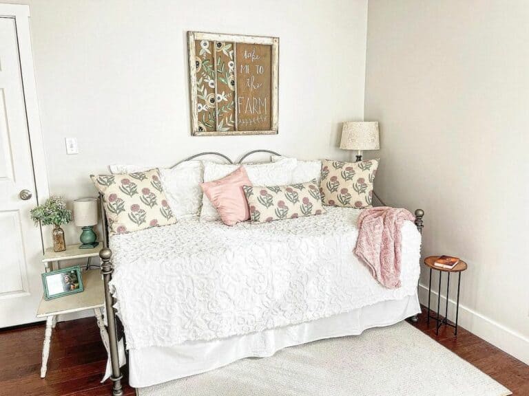 Modern Rusticity: Gray Metal Guest Bed With White and Pink Bedding