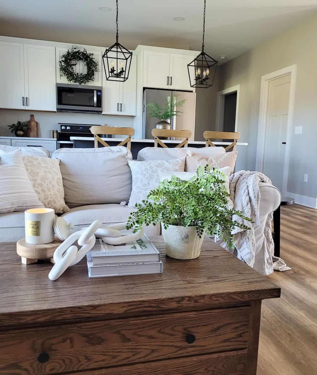 Open-Concept Living: White Sofa and Wooden Coffee Table