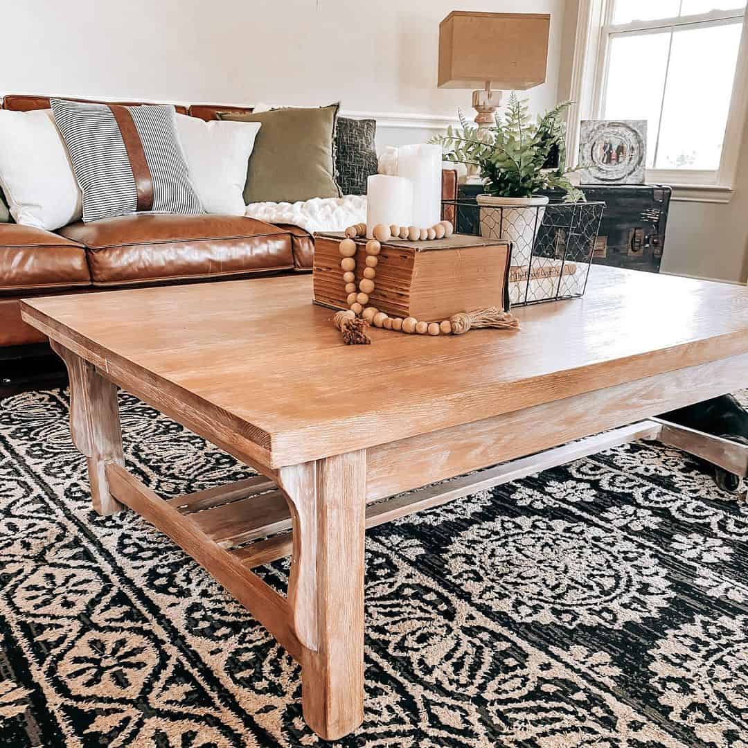 Pale Wooden Coffee Table with Brown Leather Couch