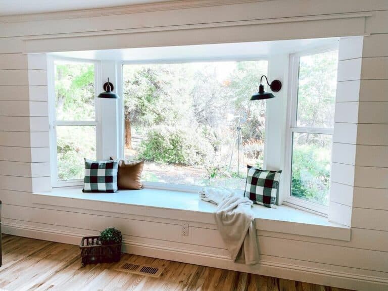 Rustic Charm: Bay Window Bench Seating Area With Shiplap Accents