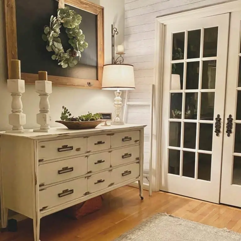 The Grand Entrance: White French Doors Define the Entryway