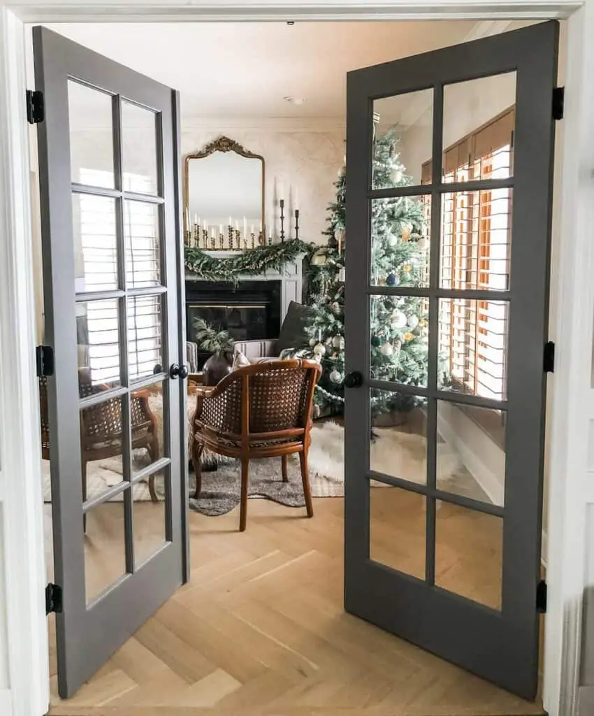 Timeless Symmetry: Dark Gray French Doors Elevate the Farmhouse Ambiance
