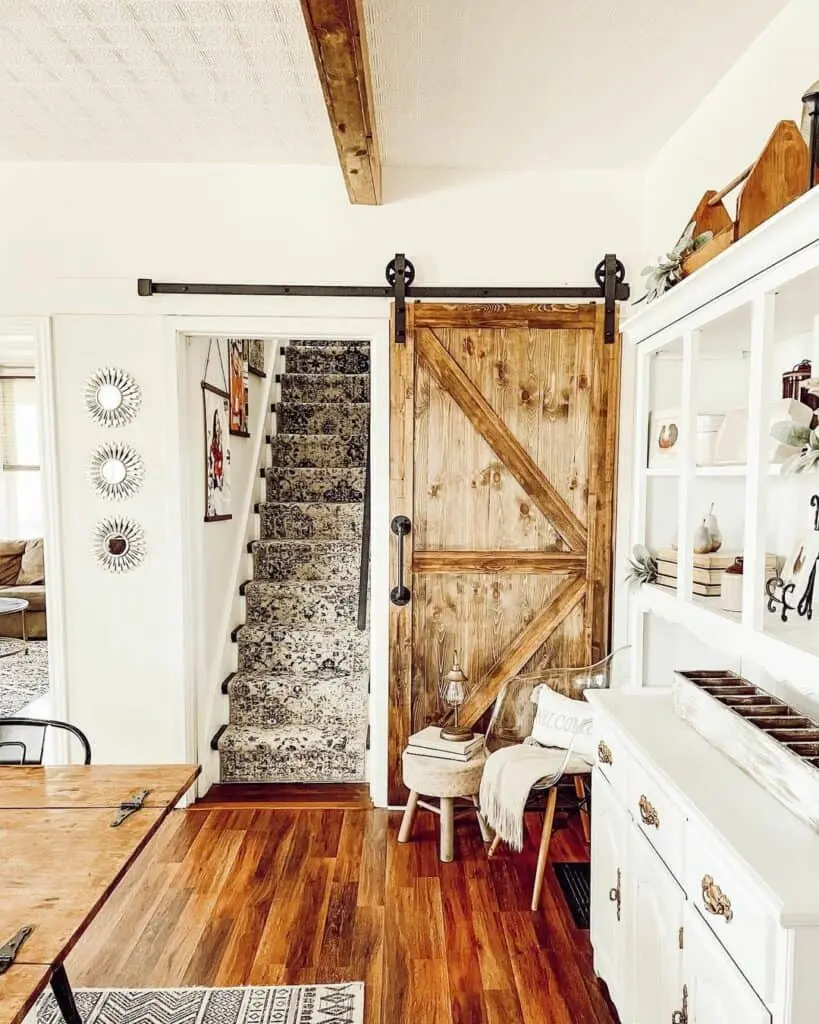 Unveiling Elegance: Sliding Barn Door Reveals Staircase Beauty