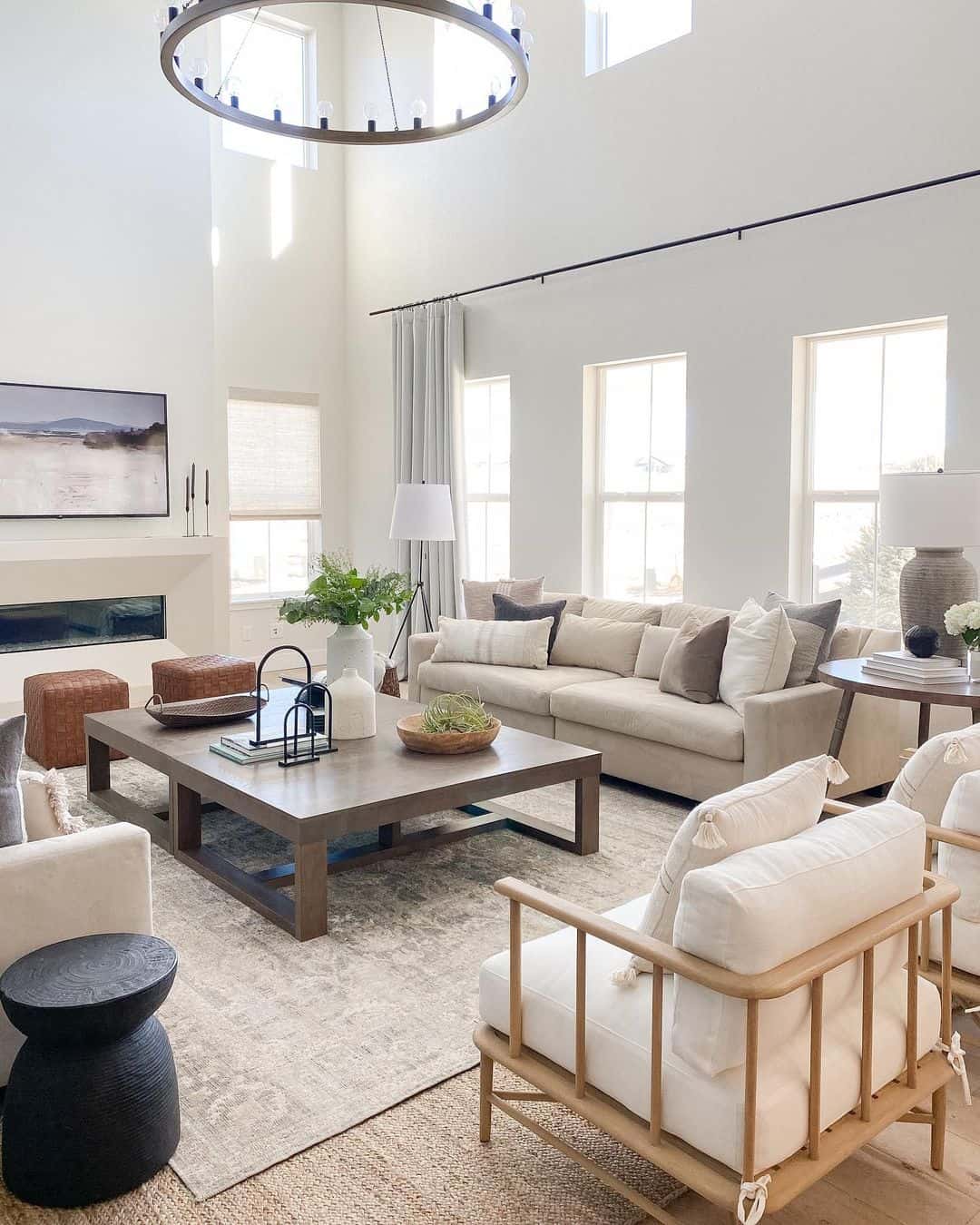 A Rustic Glow: Farmhouse Chandelier Above Wooden Coffee Table