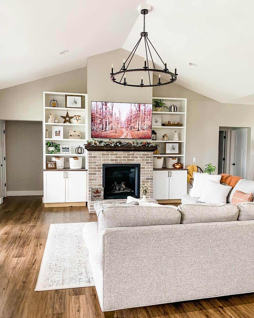 Autumnal Coziness: Classic Brick Fireplace and Fall Décor