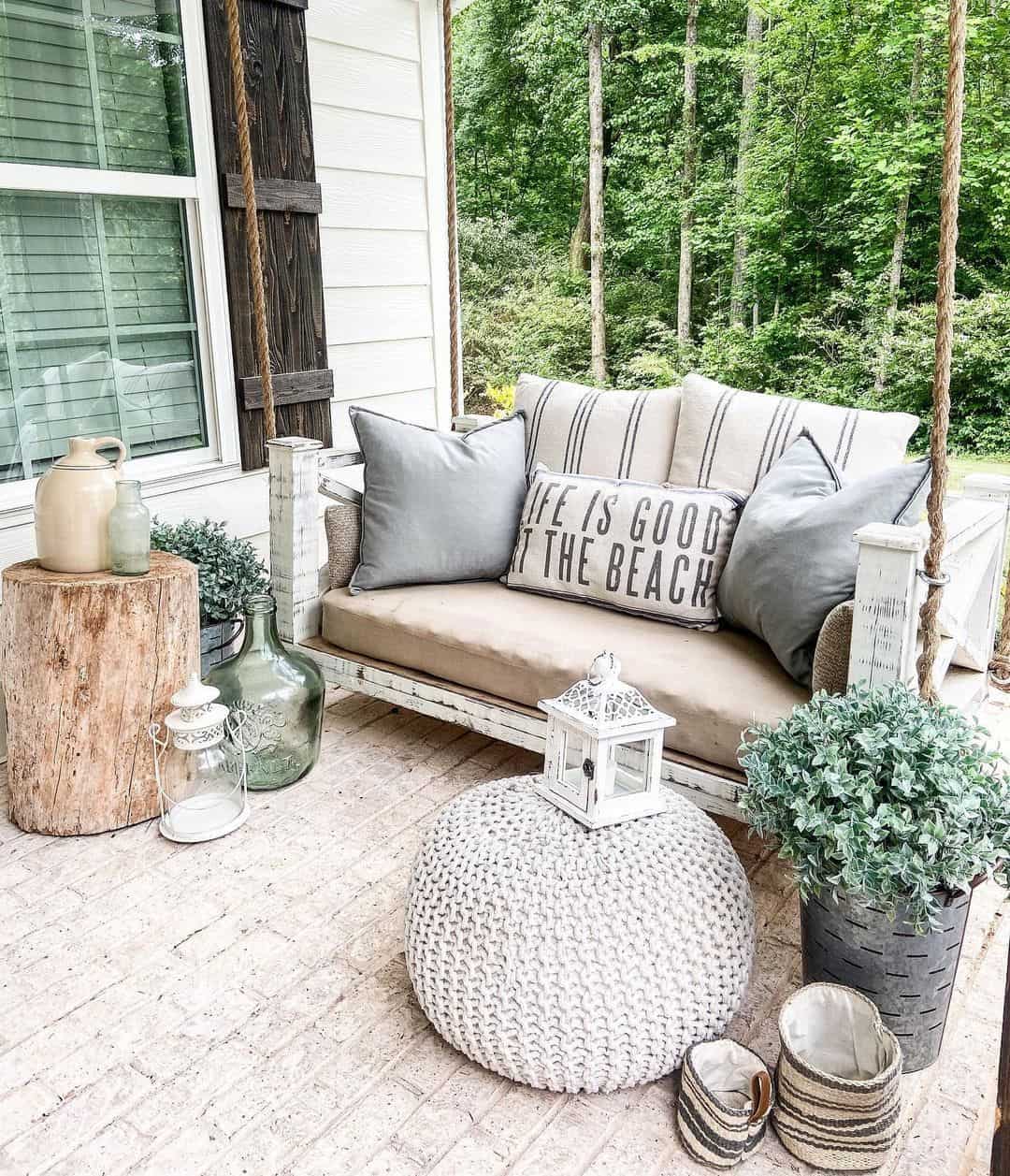 Beachy Patio Retreat with a White Porch Swing