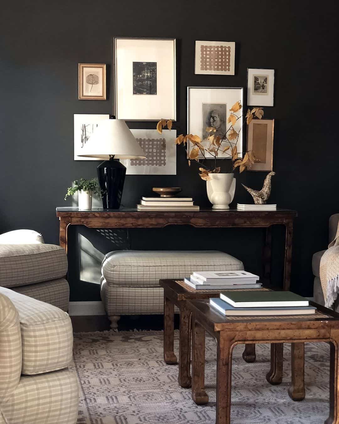 Bold Contrast: Charcoal Black Walls with Neutral-Toned Portraits