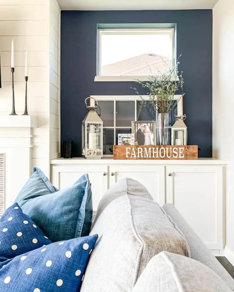 Chic Blue Pillow Accents and Crisp White Decor