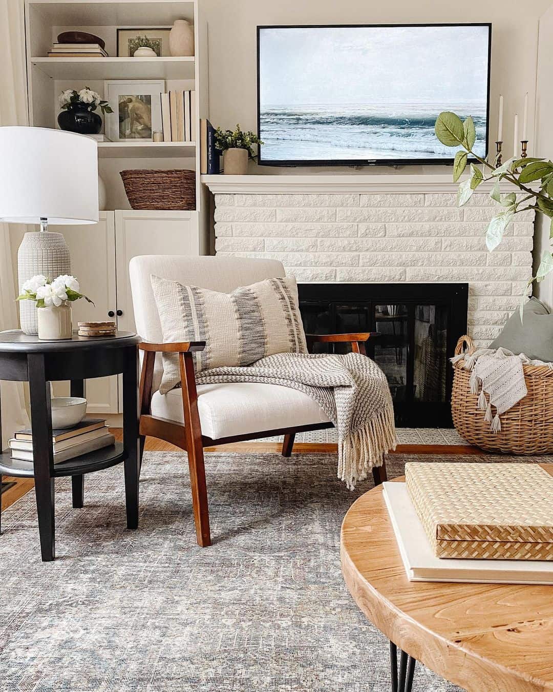 Cozy Living Room Nook Enhanced by a White Brick Fireplace