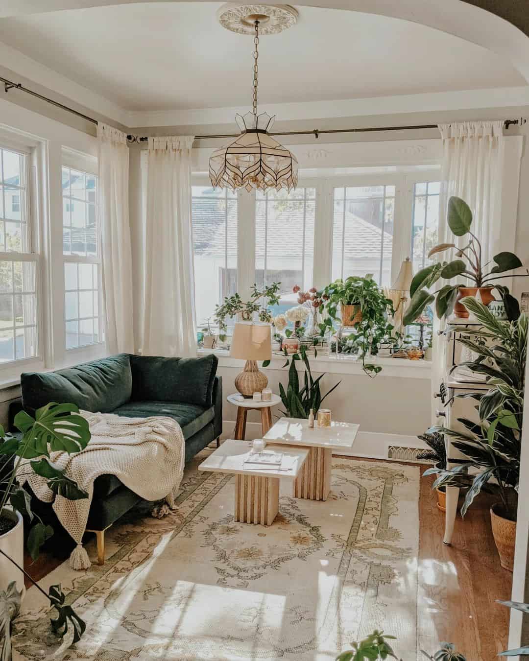 Earthy Living Room Featuring a Green Velvet Sofa