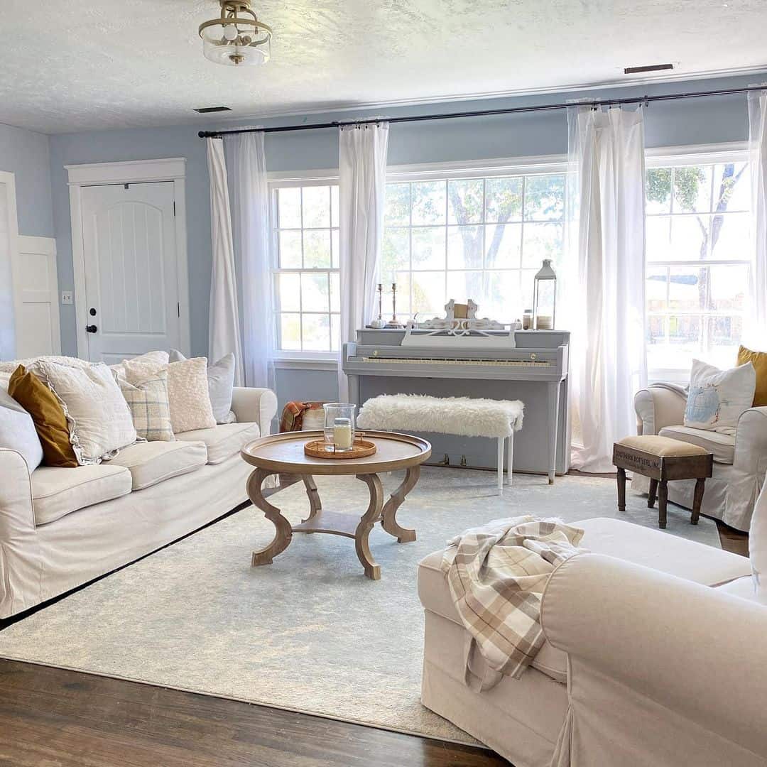 Elegant Blue and White Living Room with Piano