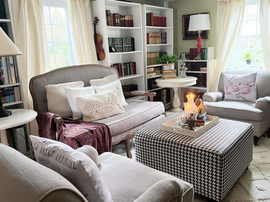 Elegant Living Room with Sets of White Open-Faced Bookcases