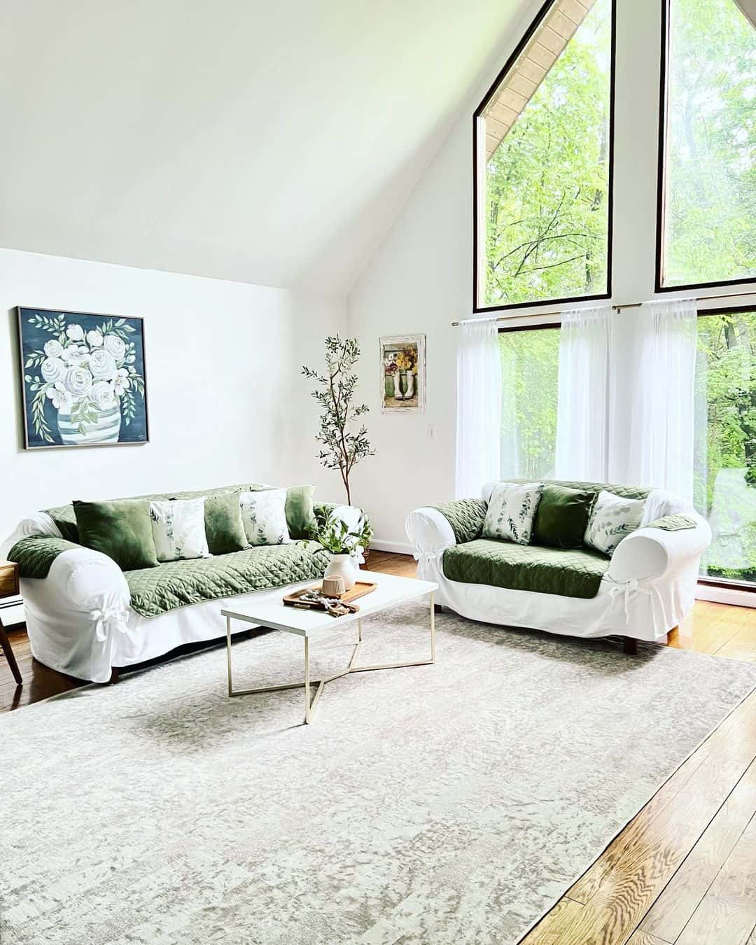 Elegant White Sofas with Green Touches