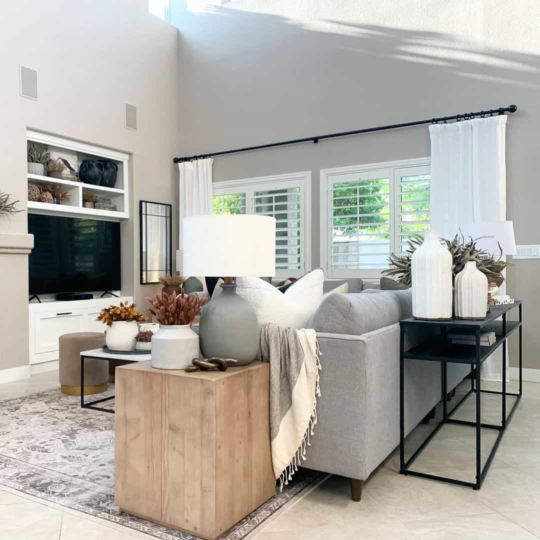 Farmhouse Chic: Light Wood End Table in a Gray Living Room