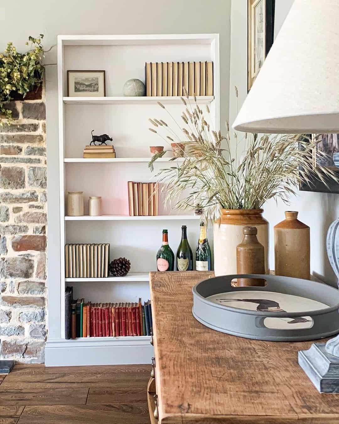 Farmhouse Living Area Featuring Open-Faced Bookcase Arrangements