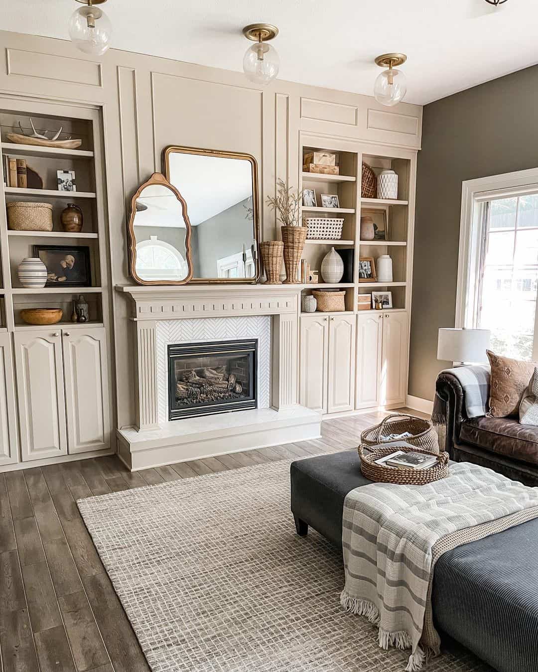 Golden Fireplace Flanked by Cabinets