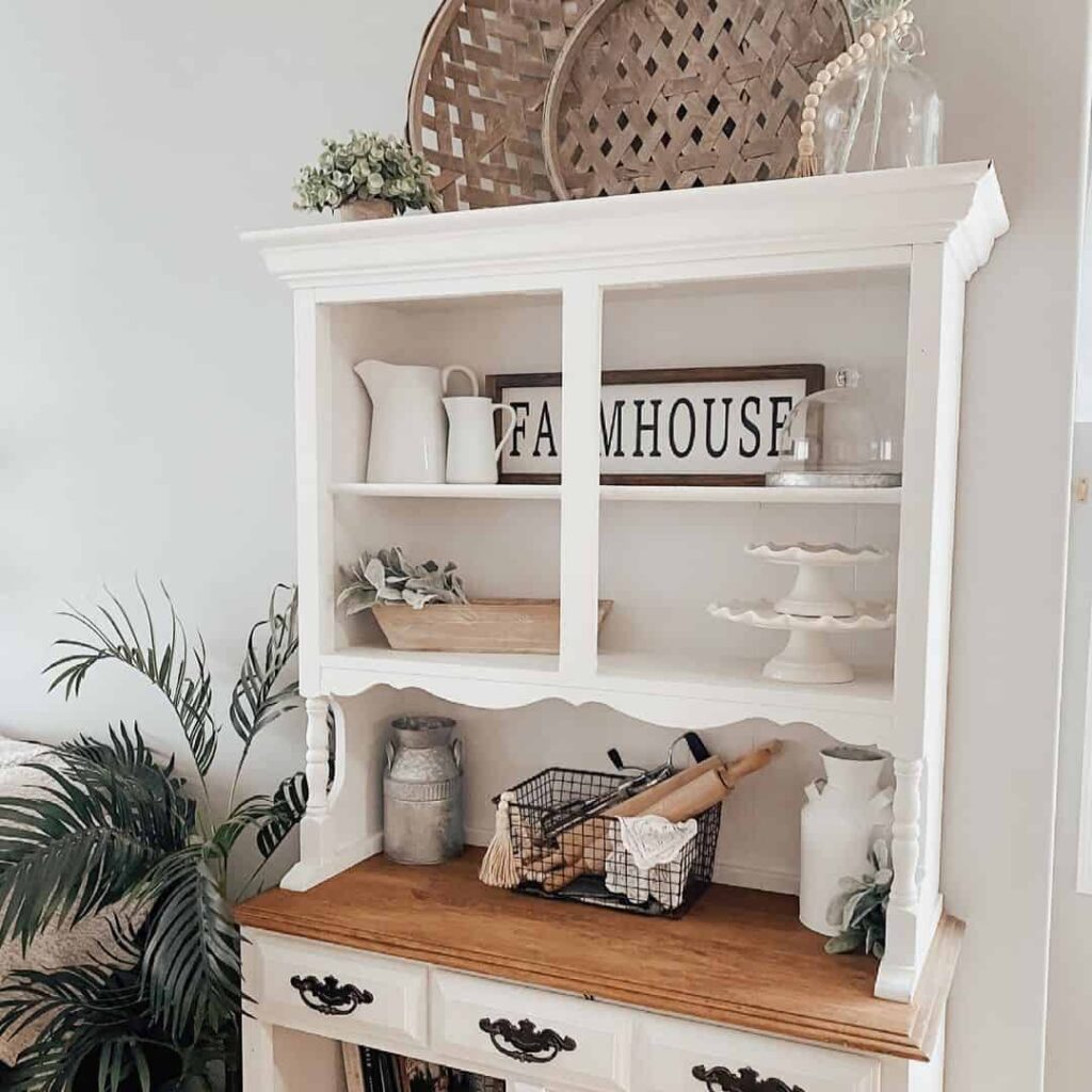 Hallway Featuring Cabinet with White-and-Wooden Accents