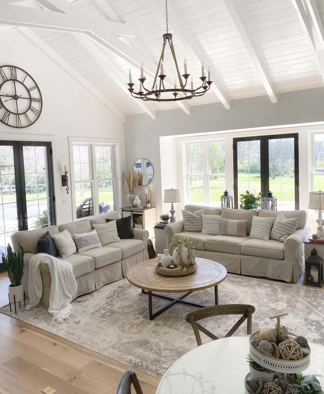 Industrial Elegance: White Shiplap Ceilings and Bold Industrial Lights