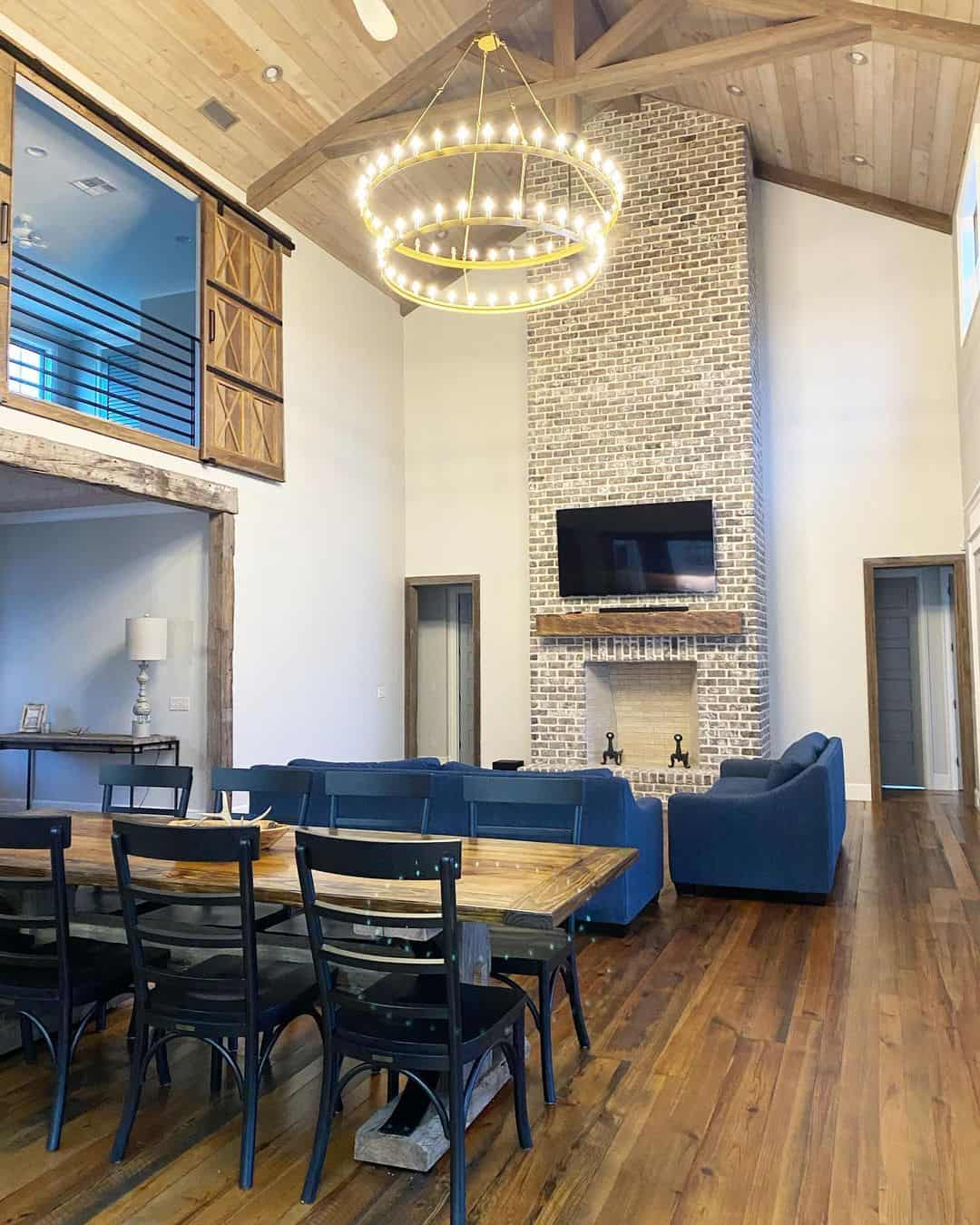 Luxurious Radiance: Wood Paneled Vaulted Ceiling and Exposed Trusses