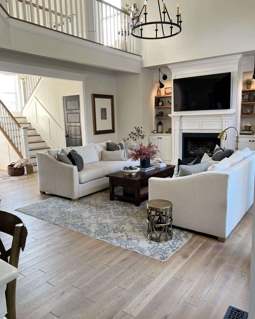 Mirrored Elegance in a Cozy Modern Farmhouse Living Room