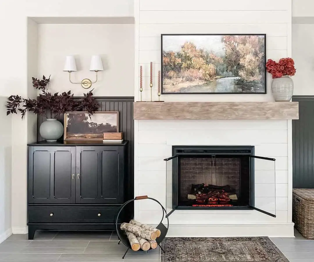 Modernize Your White Fireplace with a Black Iron Firewood Holder