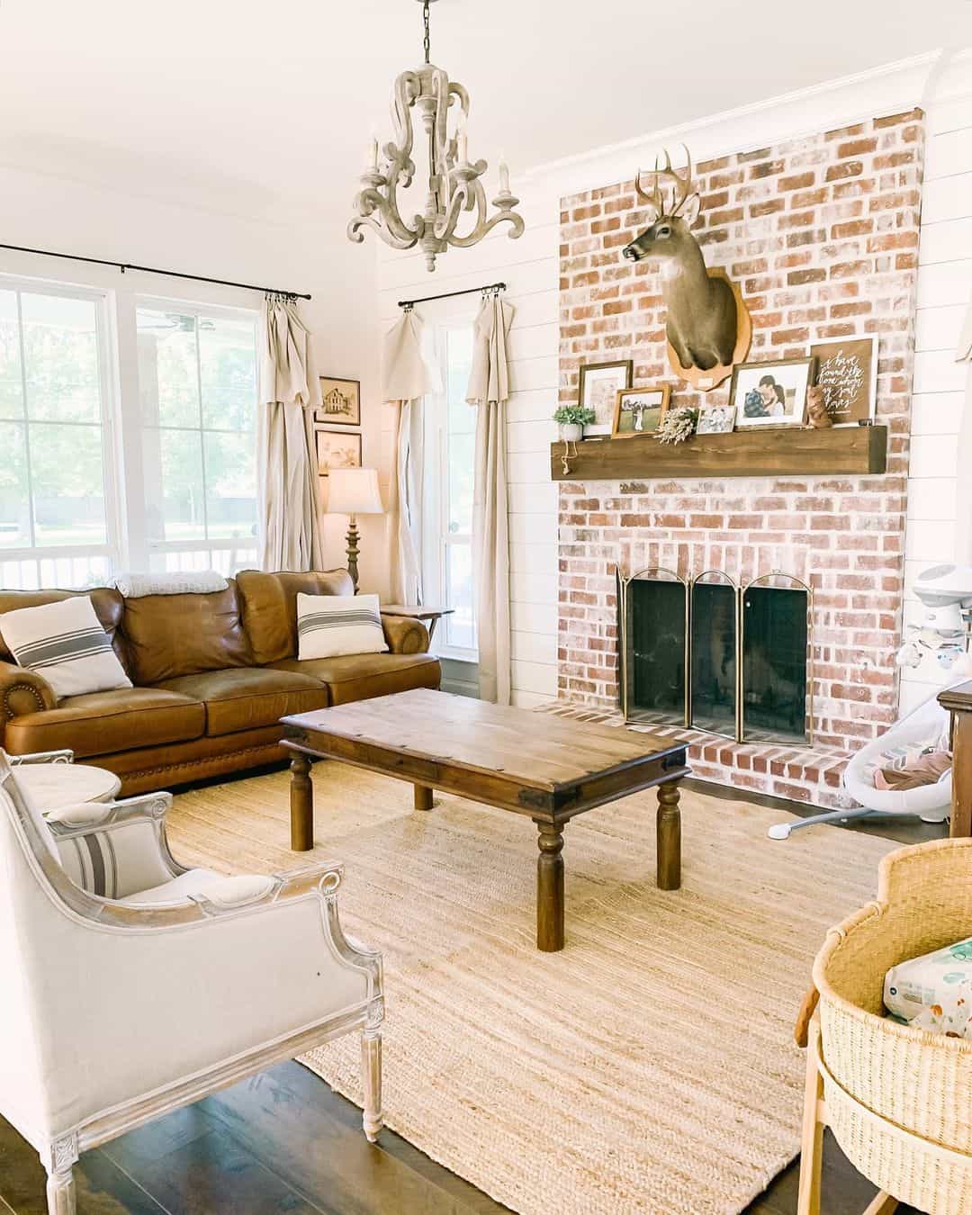 Rustic Brick Living Room Fireplace with Deer Head Accents