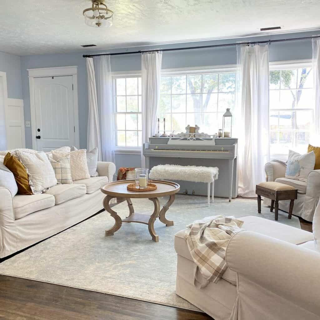 Serene Light Blue Piano in Blue and White Living Room