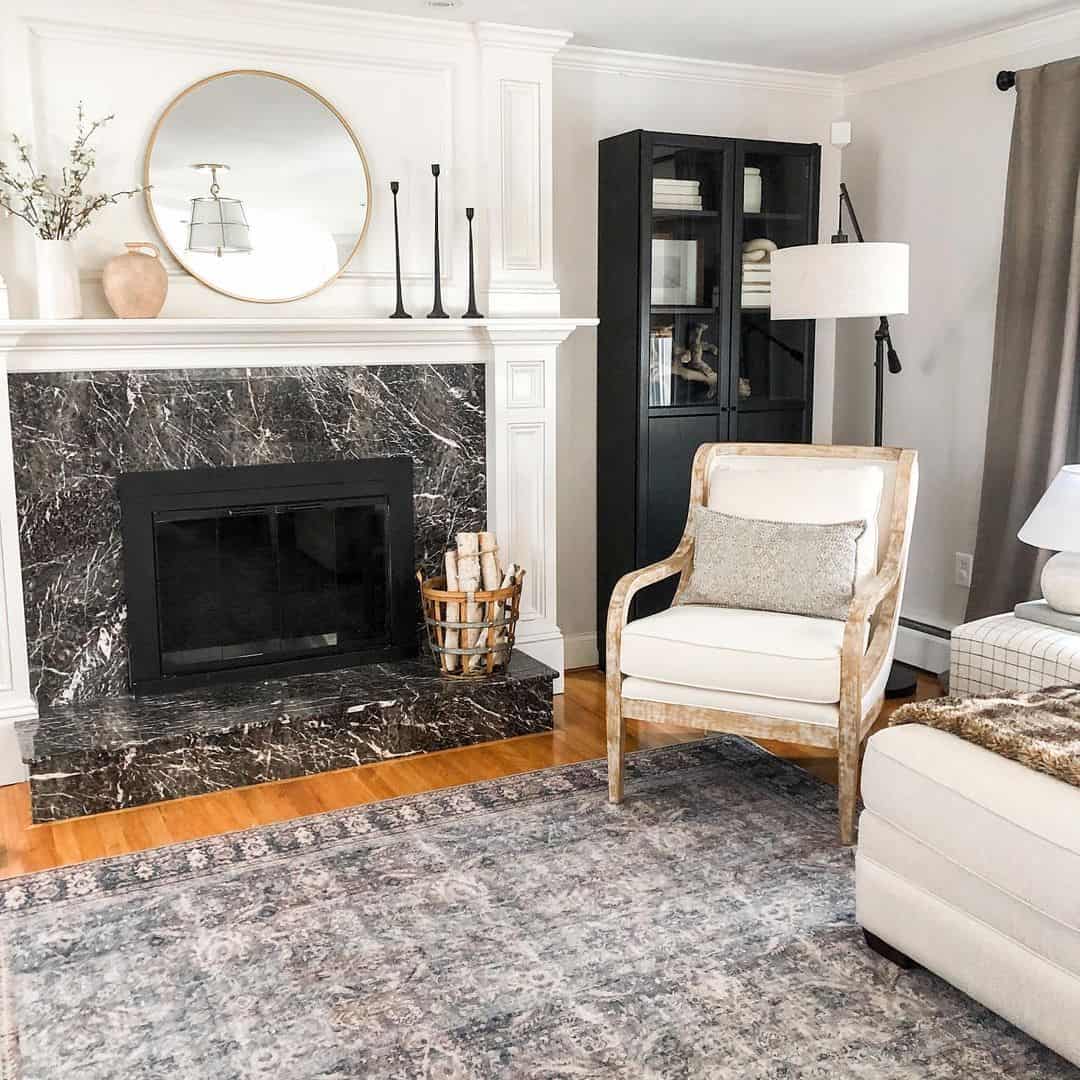 Sophisticated Black Marble Fireplace and Vintage Steel Firewood Basket