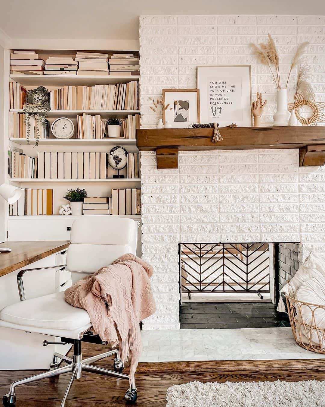 Stylish White Built-in Shelves Adorned With Books