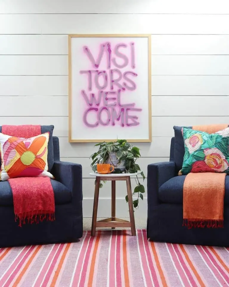 Vibrant Sitting Room Infused with Magenta, Orange, and Navy Blue