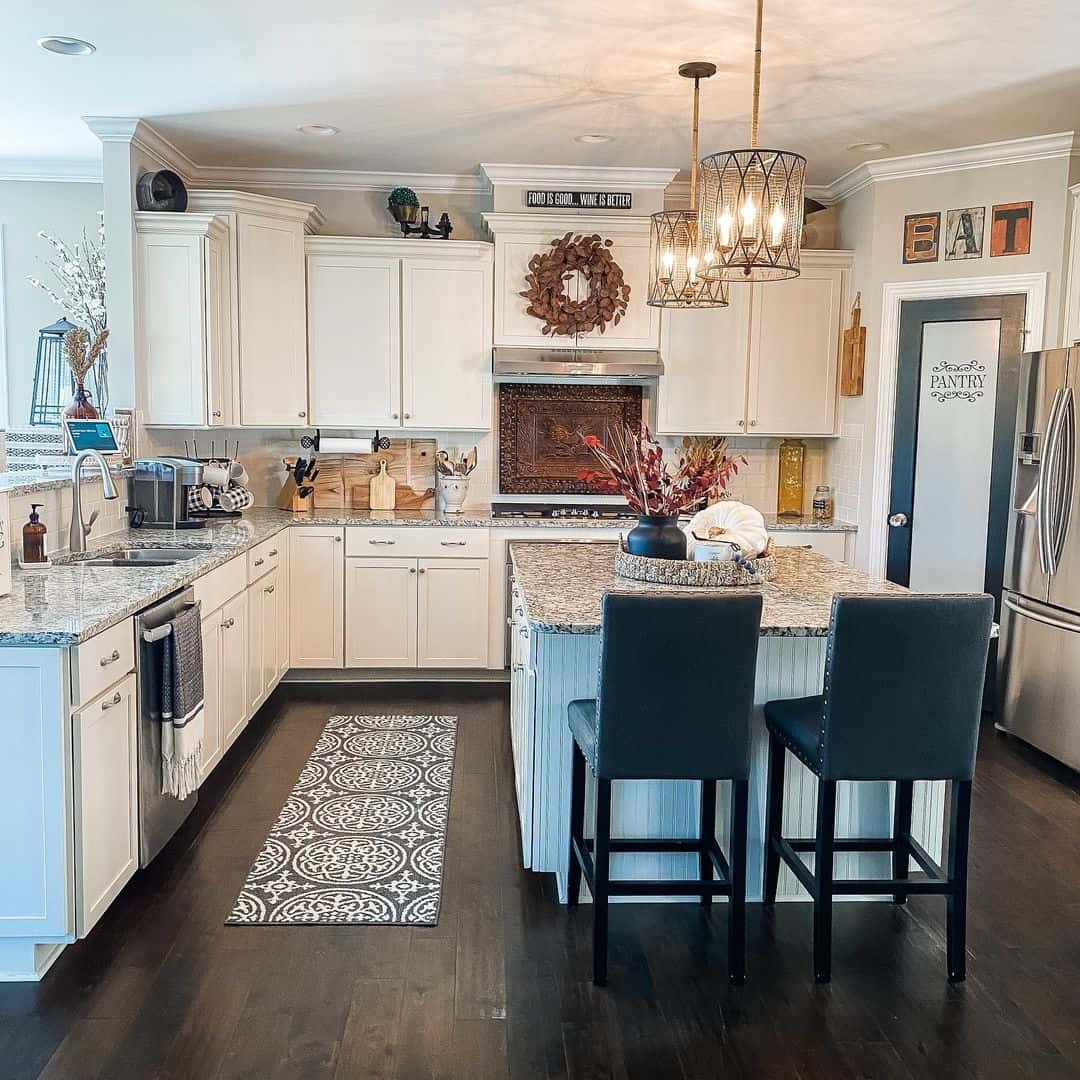 A White Beadboard Island Accompanied by Sleek Gray Dining Chairs