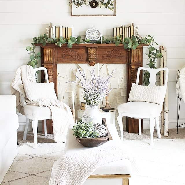 Bright Room Featuring a Faux Fireplace