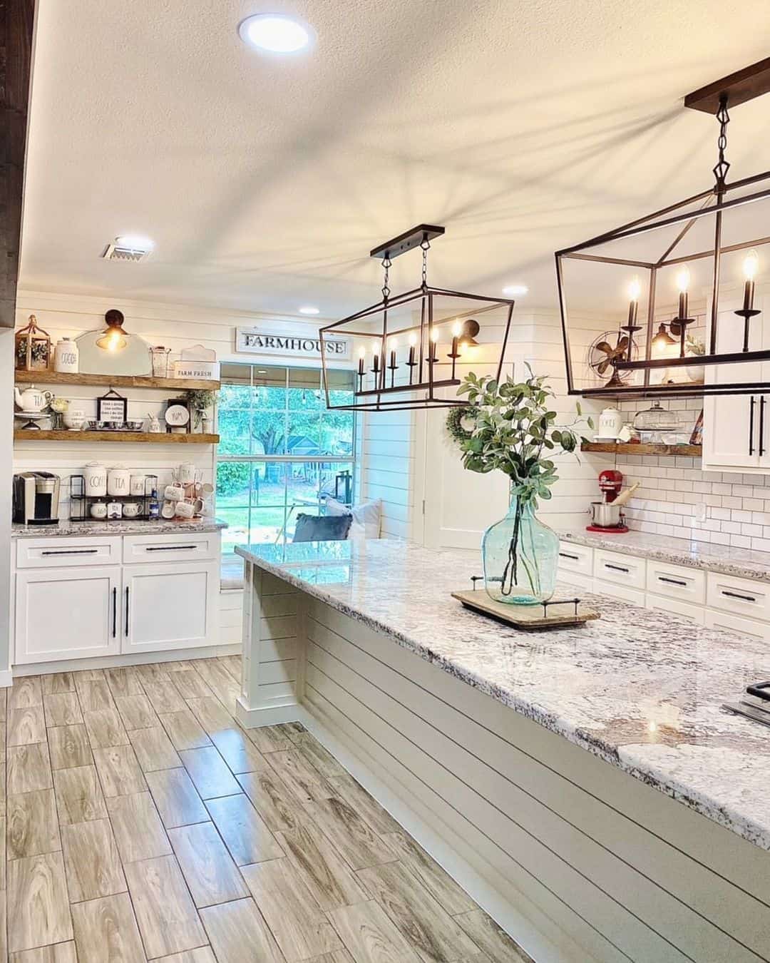 Bronze Pendant Lights Over White Shiplap Island