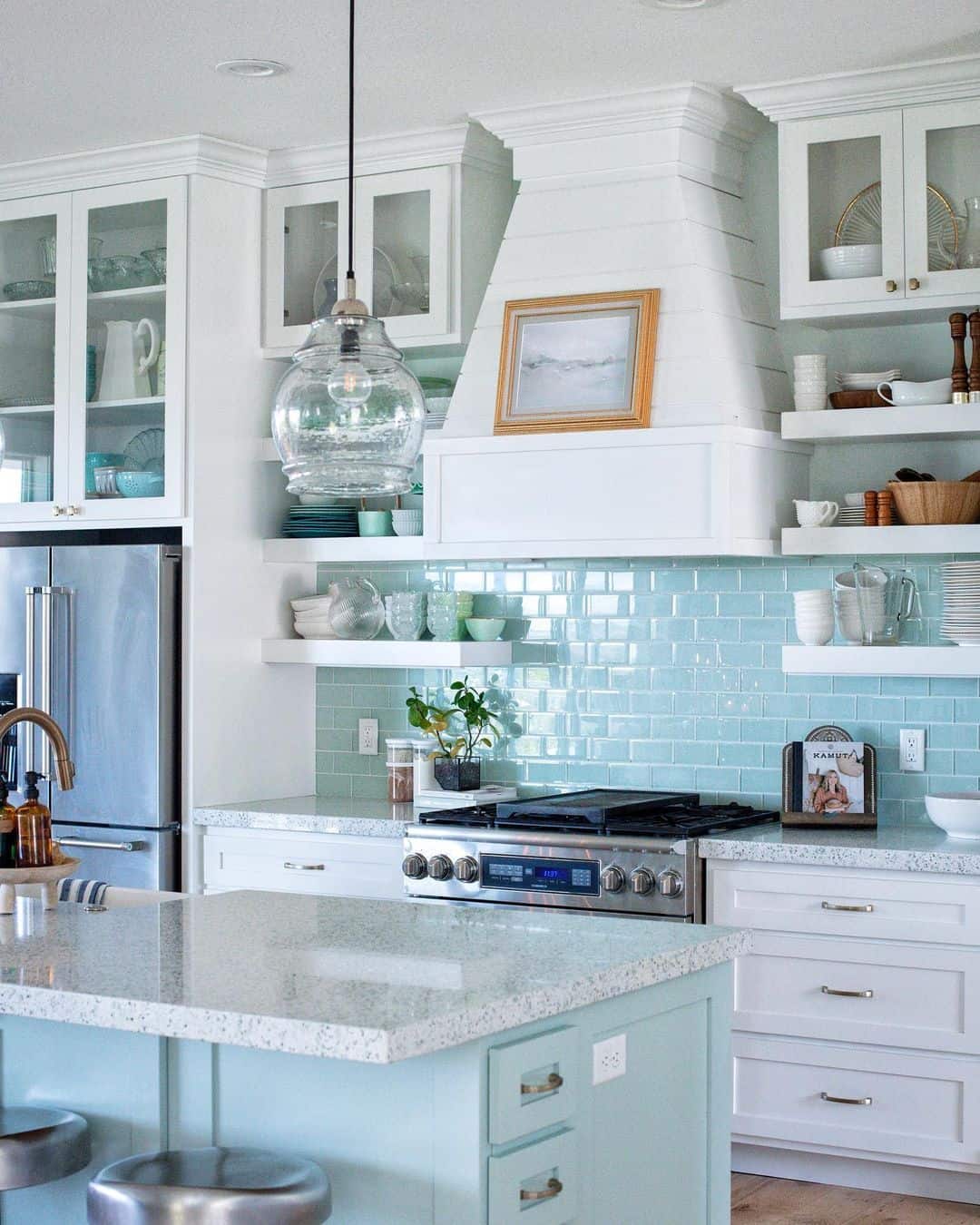 Contemporary Elegance with a Cloud Blue Backsplash