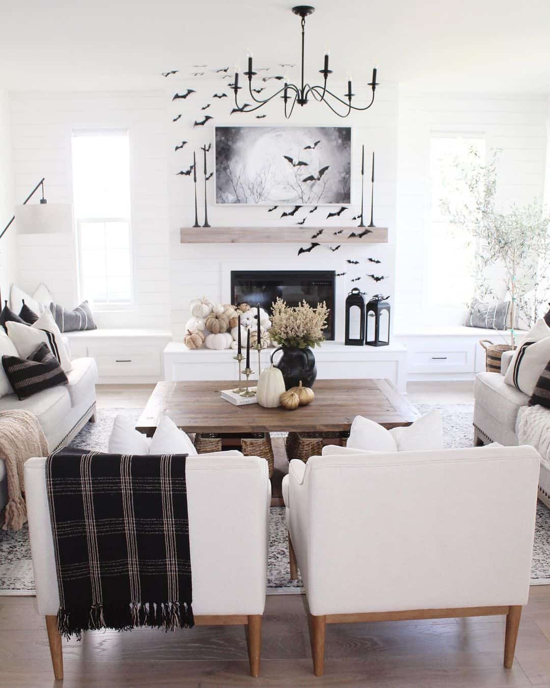 Cozy Seating Area Around a White Shiplap Fireplace