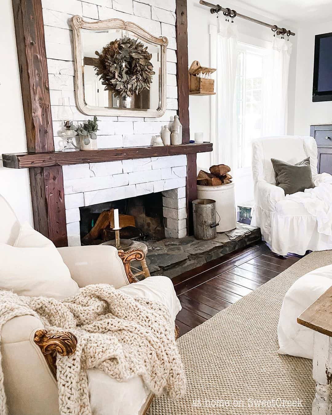 Dark Wood Accents in a White Farmhouse Living Room